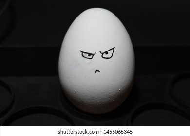 angry-egg-face-dark-background-260nw-1455065345.jpg