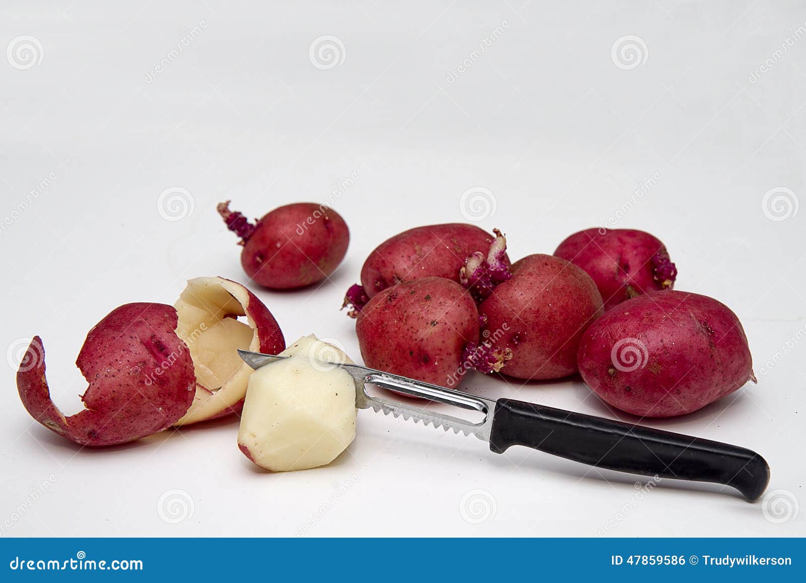 peeling-red-potatoes-perry-knife-small-isolated-white-47859586.jpg