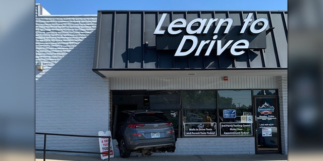 d2747598-Driving-instructor-crashes-into-building.jpg